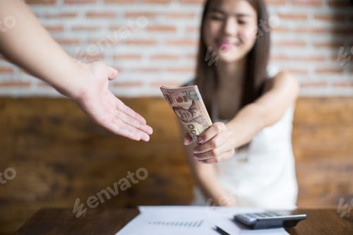 Preview: Businessmen Close The Sale By Holding Cash.
