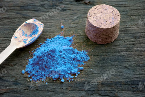 Preview: Close Up Of Powder Blue Paint On Wooden Background