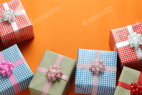 Preview: Mix Christmas Gift Box Placed On A Orange Art Paper Floor And Have Copy Space For Design In Your