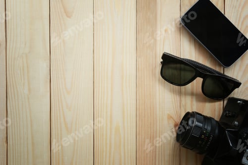 Preview: Summer Travel Equipment On Brown Wood Background.