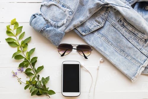Preview: Sunglasses ,Mobile Phone And Jacket Jeans Of Fashion Lifestyle Woman Relax On Background White