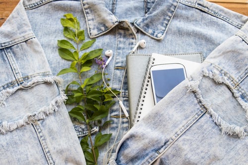 Preview: Jean Jacket with Notebook and Plant on Wood