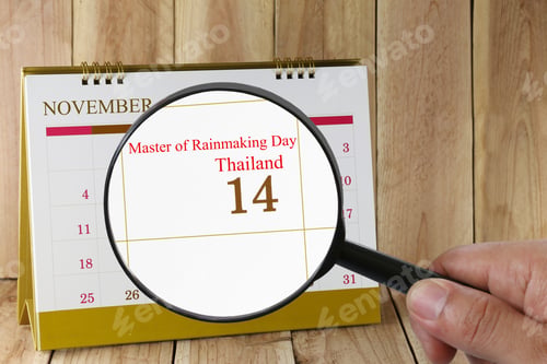 Preview: Magnifying Glass In Hand On Calendar You Can Look Master Of Rainmaking Day,Thailand On 14