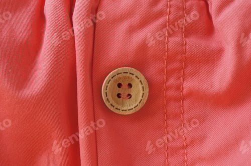 Preview: Wooden Button On Pink Cloth