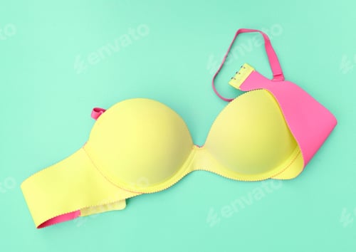 Preview: Summer Concept, Yellow Bra On Blue Background. (Pop Art Style)