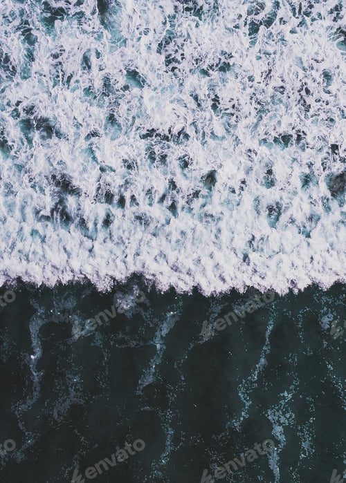 Preview: A Vertical Shot Of Sea Waves And The Foam - Perfect For Background