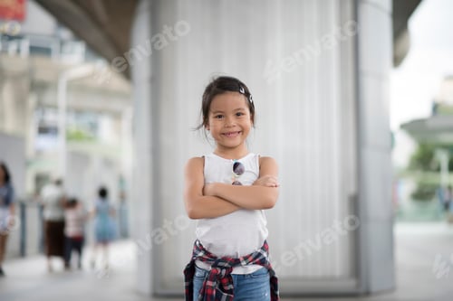 Preview: Smart Little Girl Child Standing In City