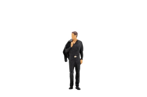 Preview: Miniature People Businessman Standing Isolated On White Background With Clipping Path