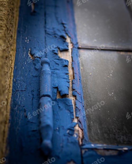 Preview: A Vertical Shot Of The Details Of A Wooden Door With Peeled Off Blue Paint
