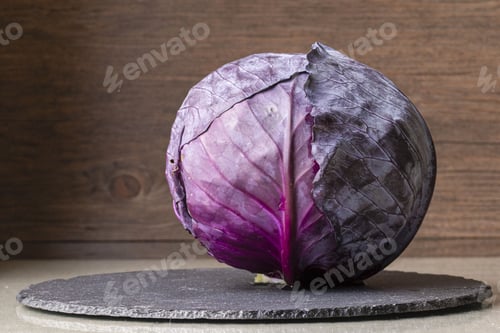 Preview: The Closeup Of Red Cabbage On Wood Background