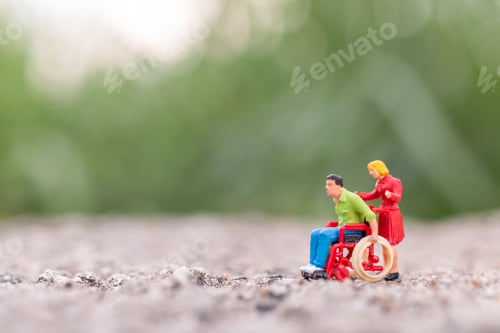Preview: Miniature People : Disabled Man Sitting In Wheelchair In The Park And Copy Space For Text