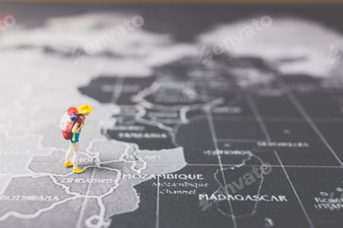 Preview: Miniature People Backpacker Walking On World Map, Tourism And Travel Concept