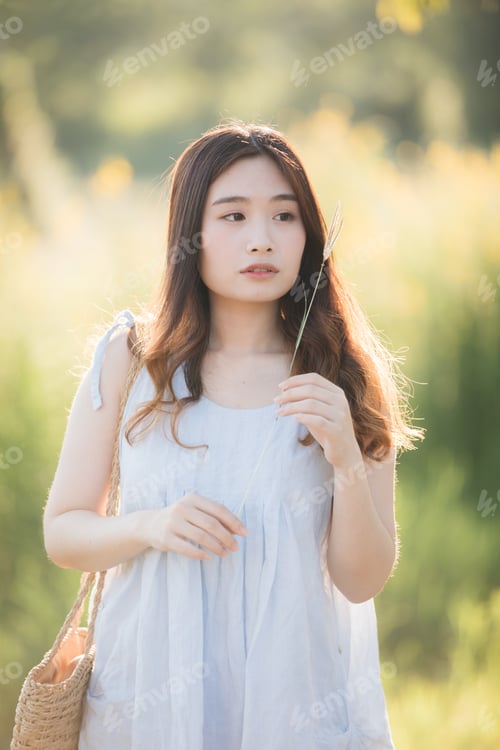 Preview: Portrait Of Young Asian Woman Girl Smile In Flower Garden
