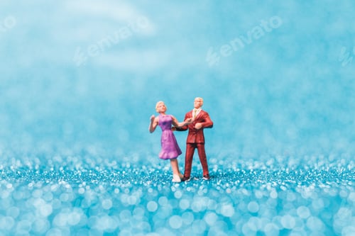Preview: Miniature People , Couple Dancing On Blue Glitter Background , Valentine'S Day Concept