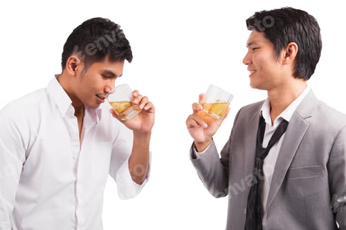 Preview: Two Businessman In Shirt And Tie Talking To Each Other While Drinking Whiskey After Office Hour.