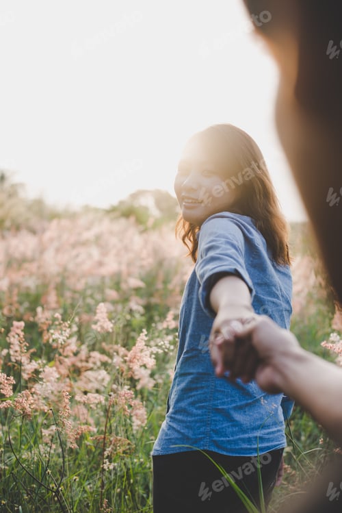 Preview: Follow Me, Happy Young Hipster Woman Pulling Guy'S Hand. Hand In Hand Walking On A Bright Sunny Day