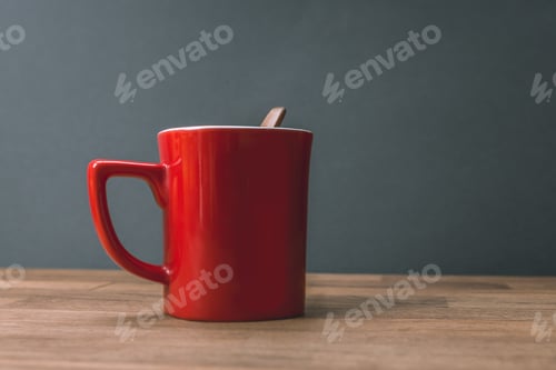 Preview: Coffee Time, Red Ceramic Cup On A Wooden Table, The Background Is Dark