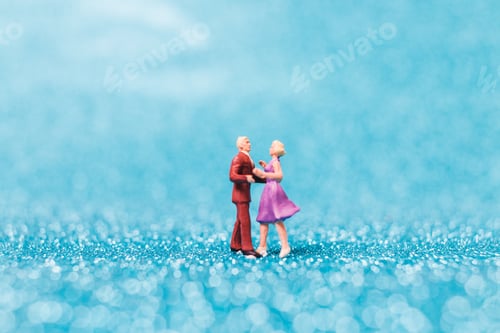 Preview: Miniature People , Couple Dancing On Blue Glitter Background , Valentine'S Day Concept