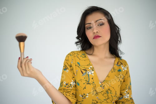 Preview: Young Beautiful Woman Touch With Powder Brush On White Background