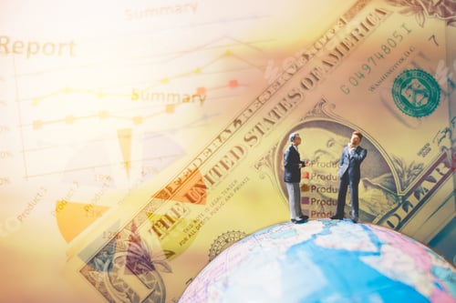 Preview: Miniature People , Businessman Standing On The Globe World Map With Graph And Dollars Banknotes For
