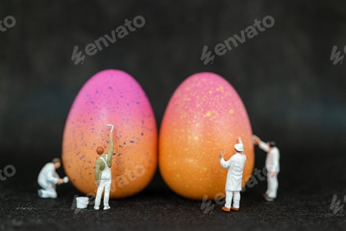 Preview: Miniature People Painting Easter-Eggs For Easter Day On Black Background
