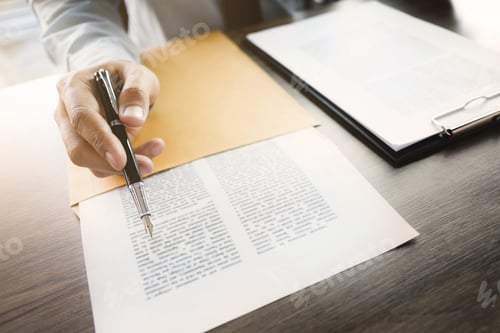 Preview: Close Up Of Secretary Reading A Annual Paper Documents In Office.