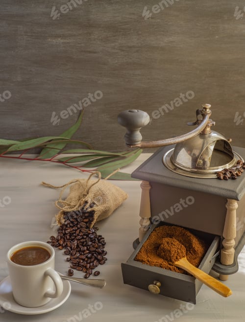 Preview: Coffee Beans And Ground Coffee With Coffee Grinder And Flowers