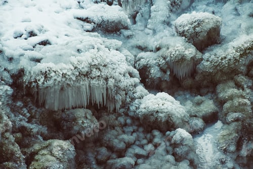 Preview: A Closeup Of Rocks Covered In The Snow And Ice Under The Sunlight In Winter - Perfect For Wallpapers