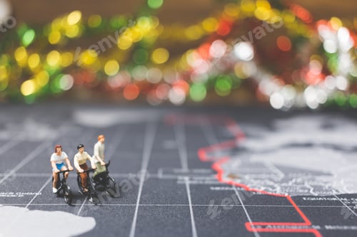 Preview: Miniature People Travelers Riding Bicycle On World Map , Traveling And Exploring The World Concept