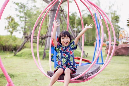Preview: Cute Beautiful Smiling Little Girl On A Playground