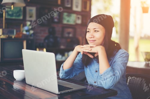 Preview: Beautiful Young Hipster Woman Sitting In A Coffee Shop, Relax And Play With Her Laptop, Find