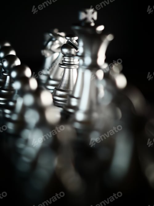 Preview: A Vertical Closeup Shot Of Metallic Silver Chess Pieces