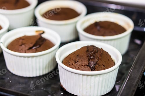 Preview: A Selective Focus Shot Of Chocolate Muffins In White Cups