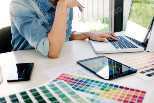 Preview: Interior Aechitect Designer At Work On Project Of Building With Colour Chart