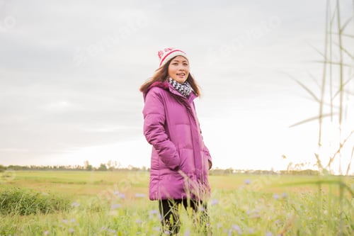 Preview: Young Woman Was Playing In A Field Of Flowers In The Winter Air.