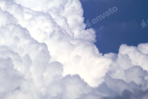 Preview: A Low Angle Shot Of The Beautiful Fluffy Clouds In The Blue Sky