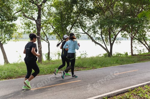 Preview: Group Of Woman Exercise Running On Park Trail In The Morning.