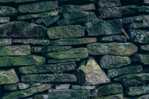 Preview: A Closeup Shot Of A Wall With Stones Of Different Sizes And Shapes