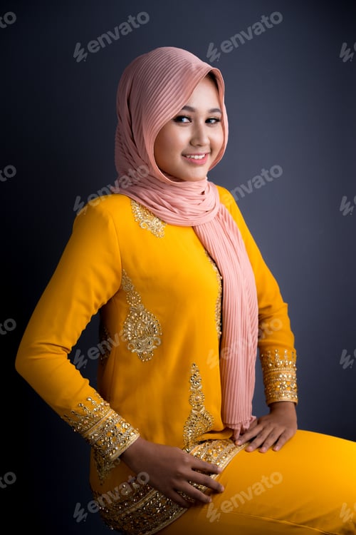 Preview: Beautiful Female Muslim Model In Yellow Modern Kurung, A Modern Lifestyle Apparel On Grey