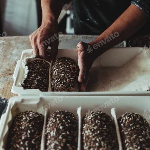 Preview: A Closeup Shot Of The Process Of Making Black Grain Bread