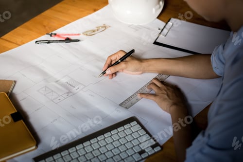 Preview: Creative Architect Projecting On The Big Drawings In The Dark Loft Office Or Cafe With Dark And
