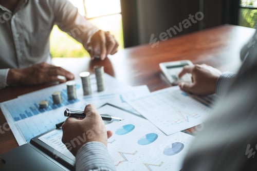 Preview: Businessmen Analyzing Financial Charts at the Workplace