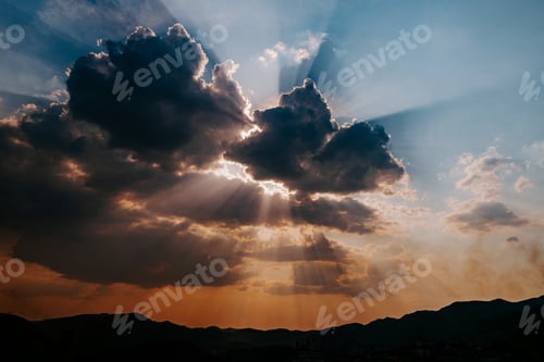 Preview: A Beautiful View Of A Scenic Sunset On A Stormy Evening
