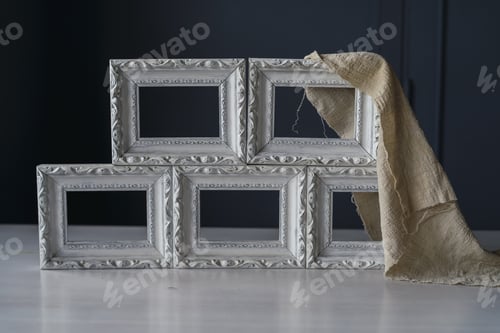 Preview: A Closeup Of Vintage Photo Frames On The Table With Fabric On It - Great For Wallpapers