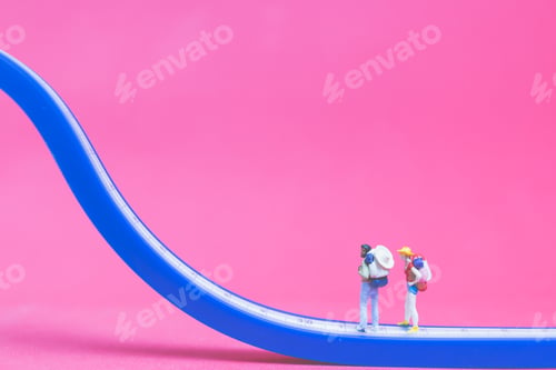 Preview: Miniature People : Couple Of Travellers On The Bridge On Pink Background , Valentine'S Day Concept