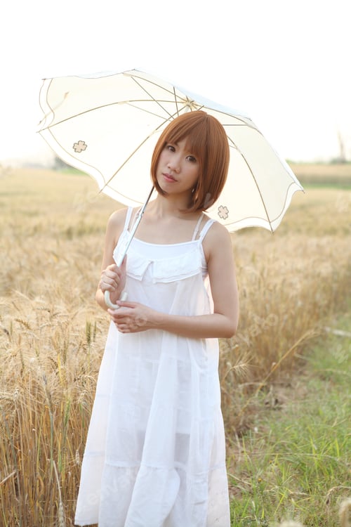 Preview: Young Smiling Woman In Field With Wheat