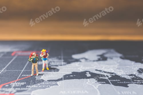 Preview: Miniature People Backpacker Walking On World Map, Tourism And Travel Concept