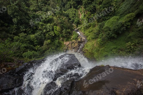 Preview: A High Angle View Of A Steep Streaming Waterfall In The Deciduous Forest