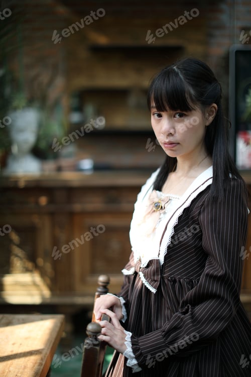 Preview: Portrait Asian Girl With Purple Flowers Background