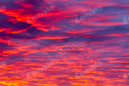 Preview: A Gorgeous Sky During A Magical Sunset With Reddish-Pink Highlights On Gentle Purple Clouds